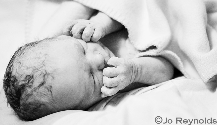 Baby Z, in mum's arms